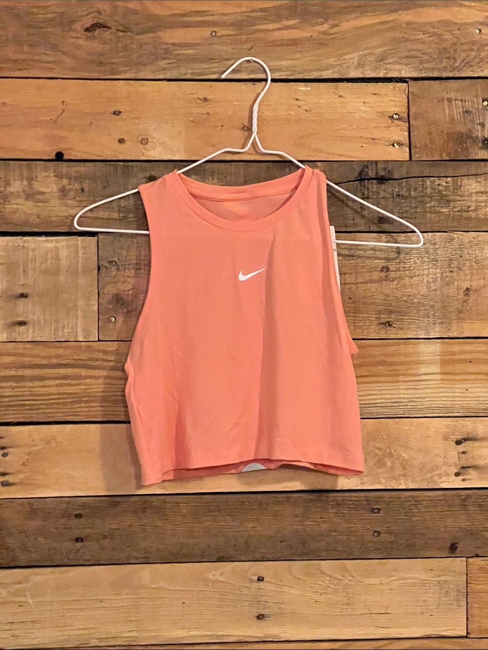 Nike Girl’s Coral-Orange Cropped Muscle Tank with White Swoosh